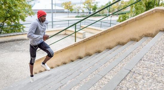 Man exercising running up stairs.